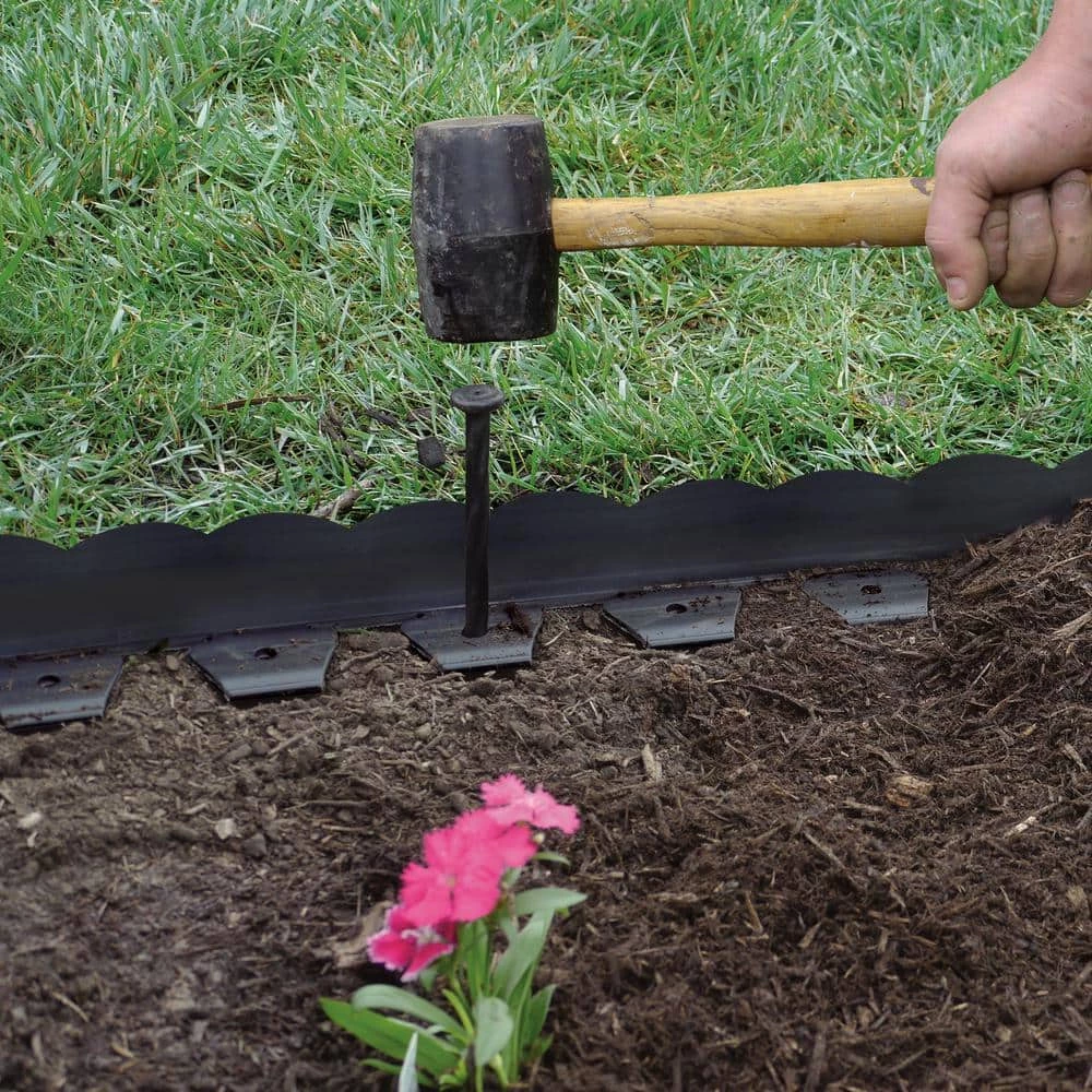 Vigoro 20 ft. x 2.25 in. Black Scalloped Polyethylene No-Dig Edging 4 Vigoro 20 ft. x 2.25 in. Black Scalloped Polyethylene No-Dig Edging - Image 2